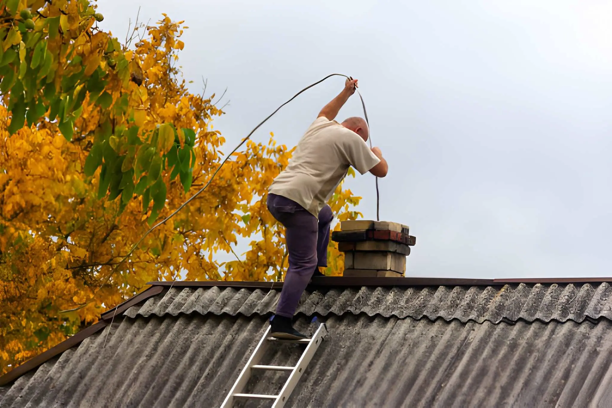 Professional Chimney Cleaning removing soot and creosote with Vent Wise - Air Duct Cleaning Services